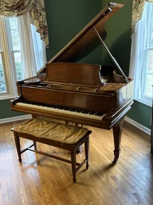 Kunis Piano Moving
